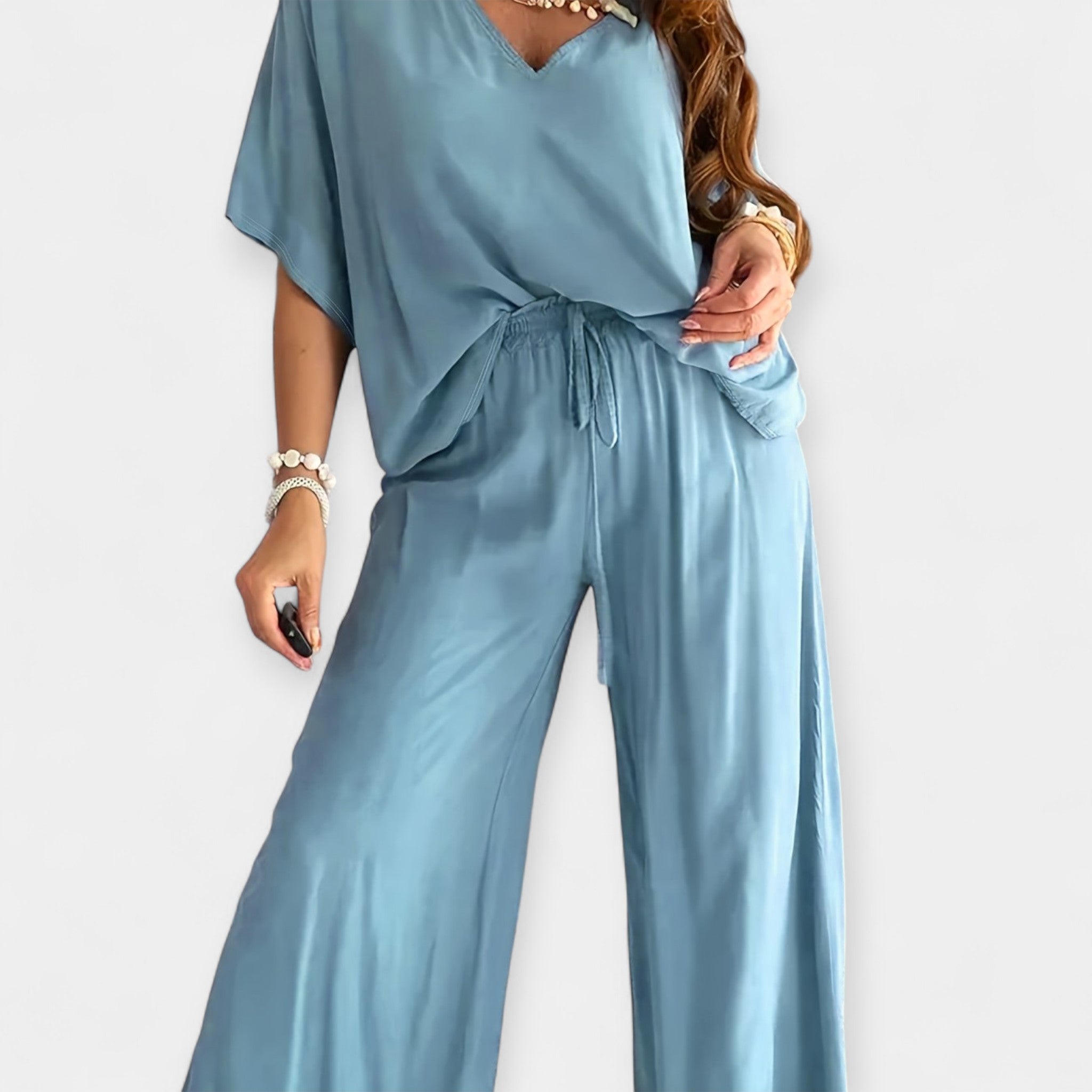 Set lejer cu pantaloni evazați și bluză