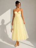 Elowina | Elegant tulle midi dress with open back and corset detail