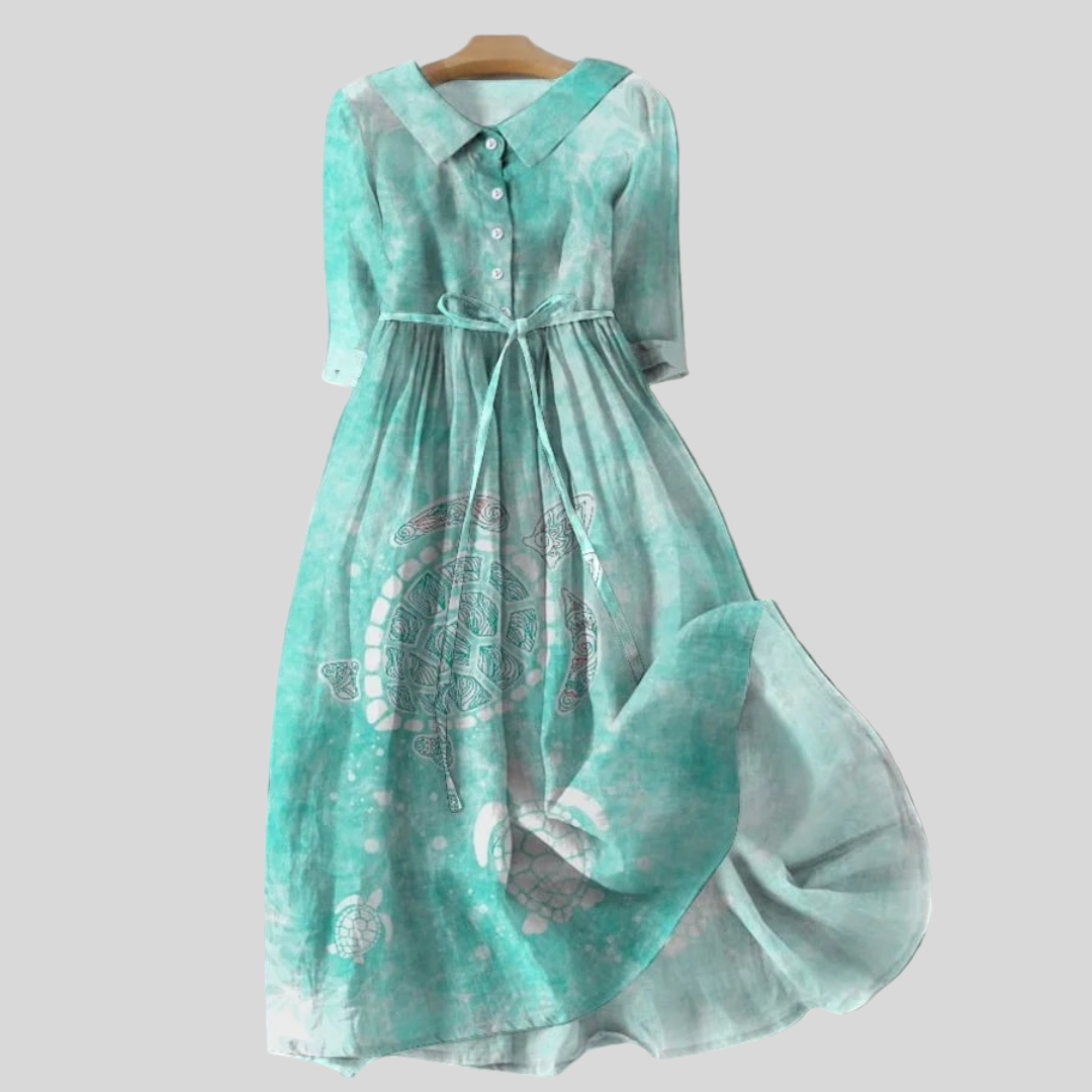 Turquoise dress with sea turtle pattern