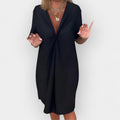 Elegant Dress with V-Neckline and Decorative Trim