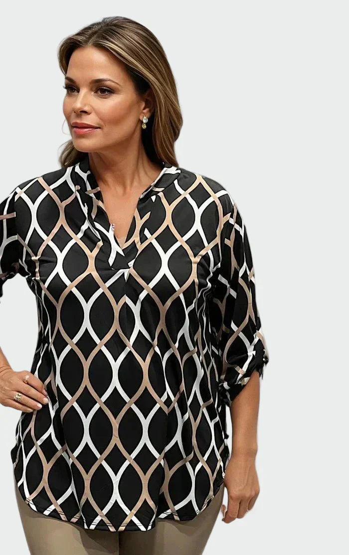 Bluză clasică cu mânecă lungă și un model elegant