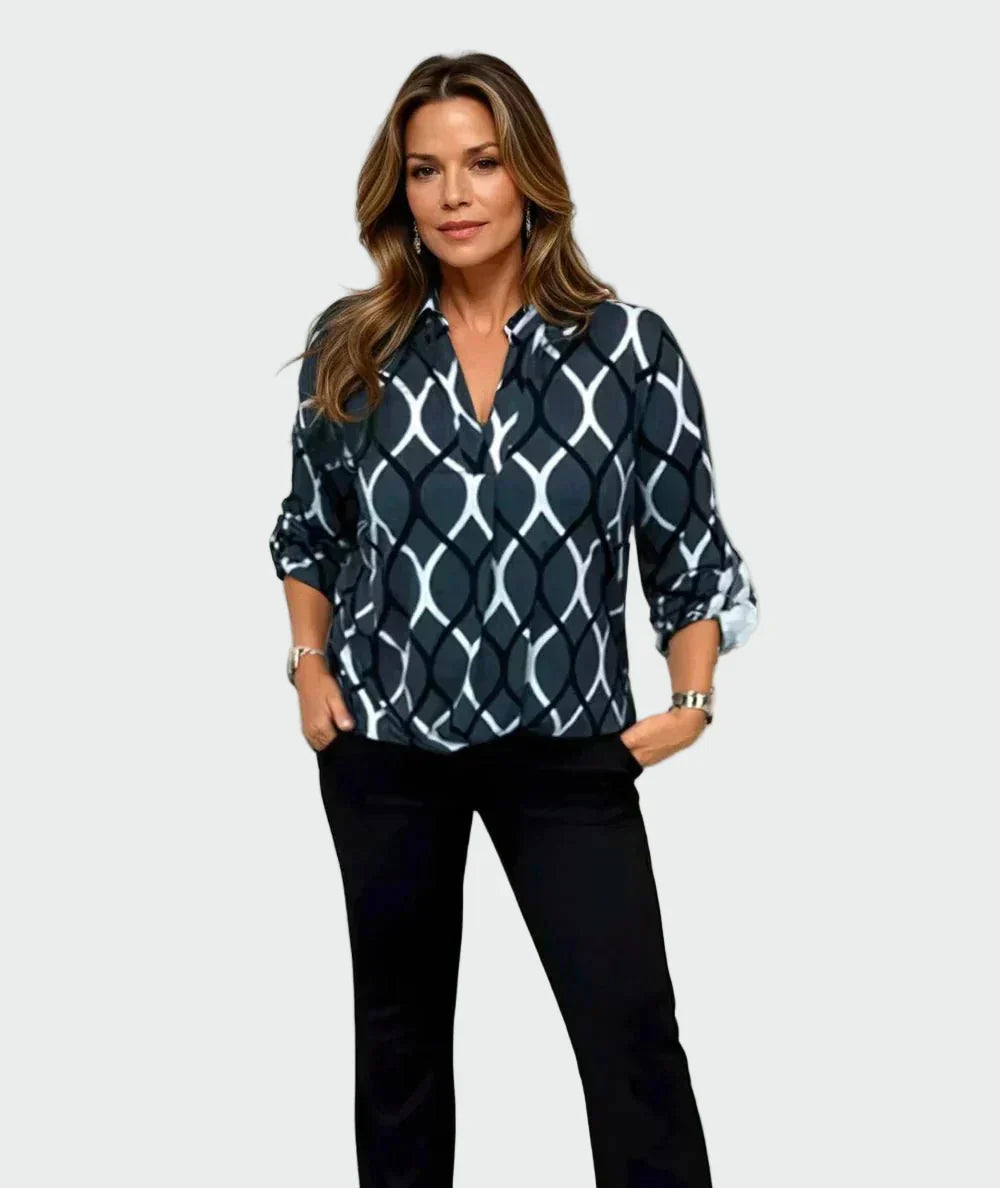 Bluză clasică cu mânecă lungă și un model elegant