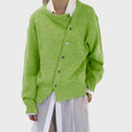 Ugnė | Soft sweater with a playful button closure detail
